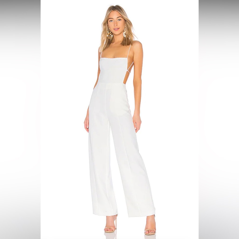 BRAND NEW NBD XS Prosecco Jumpsuit in Ivory. Never worn.